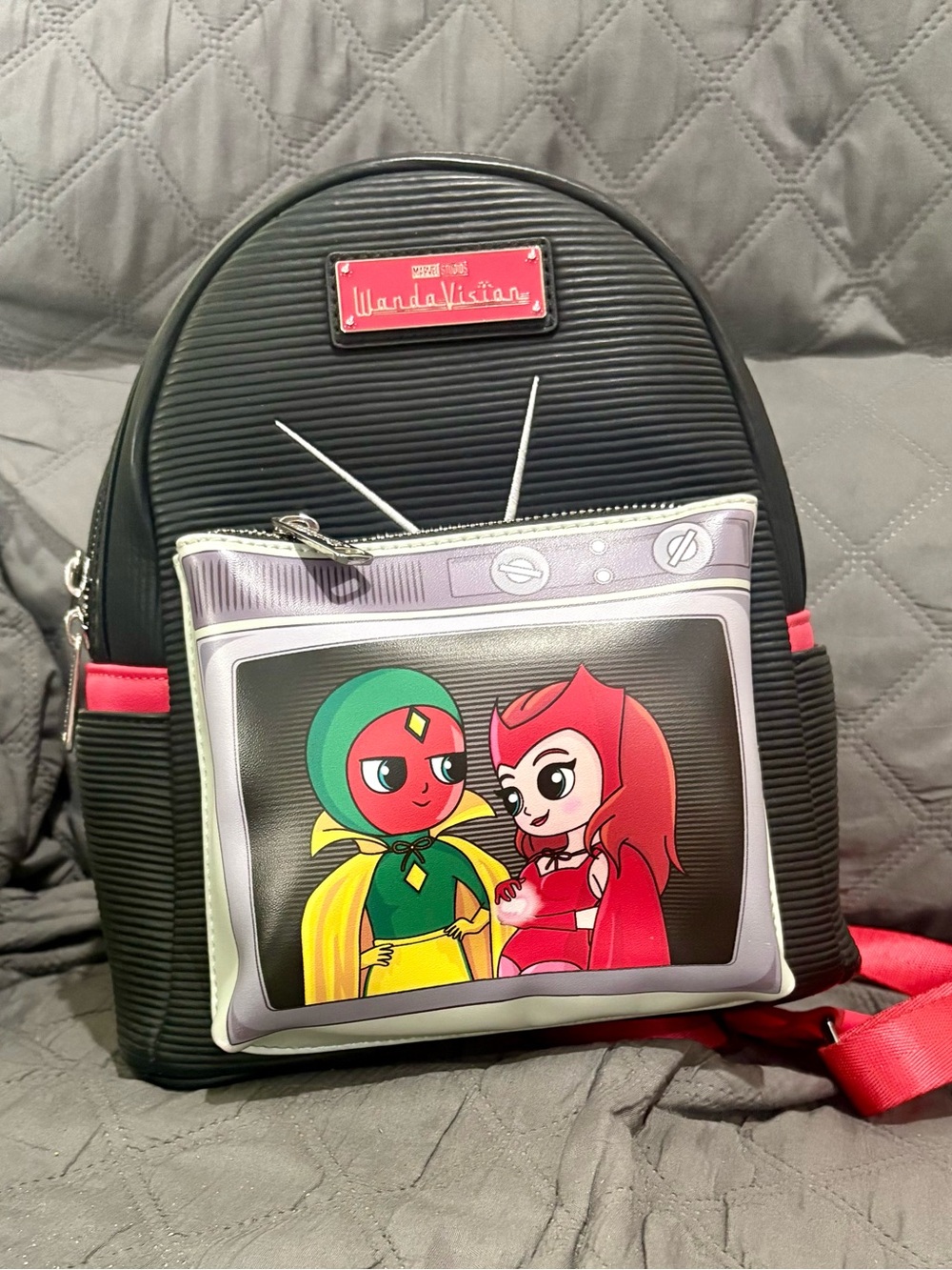 Loungefly Black Mini Backpack with Red, Green and Yellow Accents